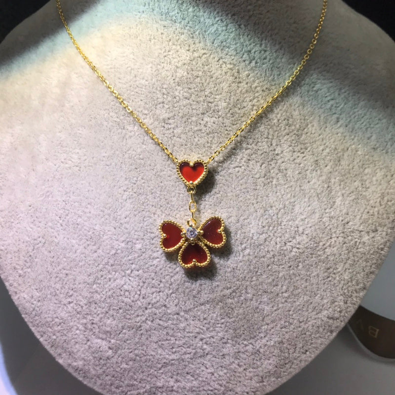Van Cleef & Arpels   Women's four-heart necklace jewelry