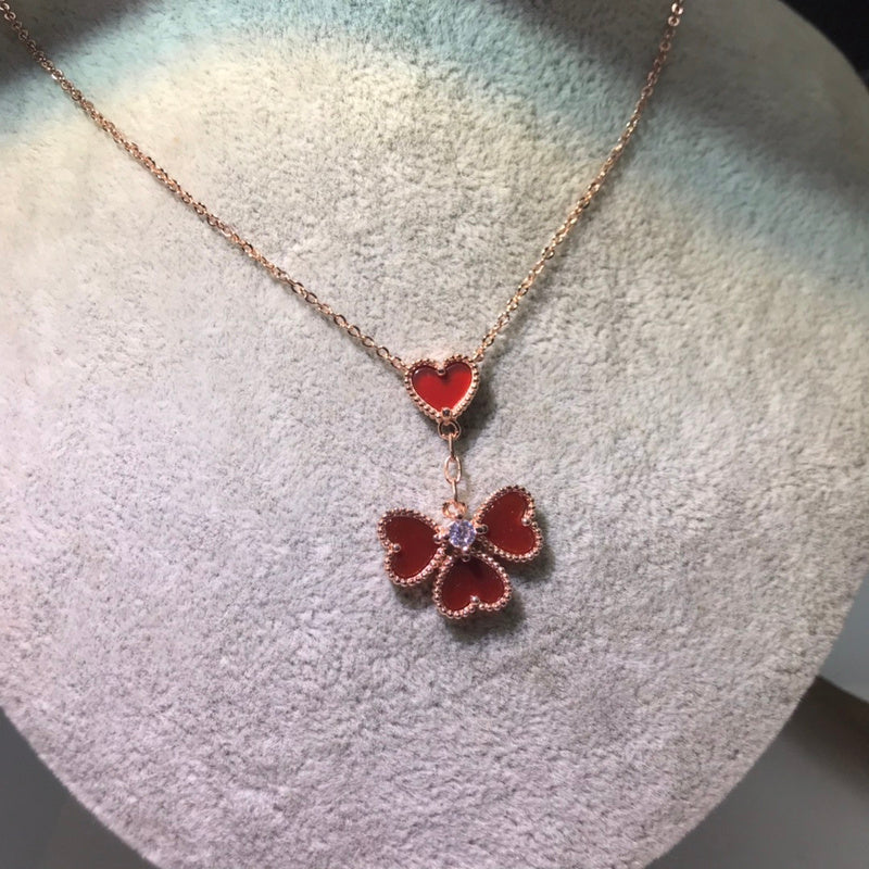 Van Cleef & Arpels   Women's four-heart necklace jewelry
