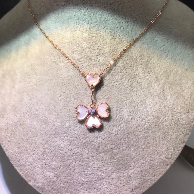 Van Cleef & Arpels   Women's four-heart necklace jewelry