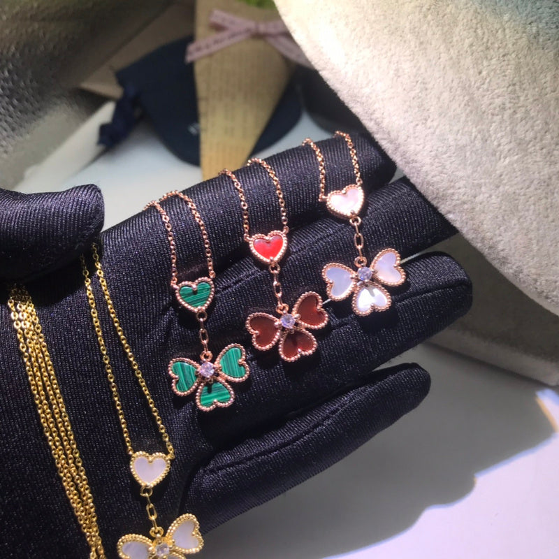 Van Cleef & Arpels   Women's four-heart necklace jewelry