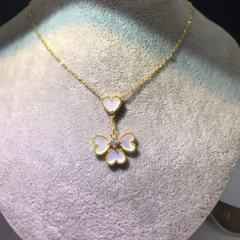 Van Cleef & Arpels   Women's four-heart necklace jewelry