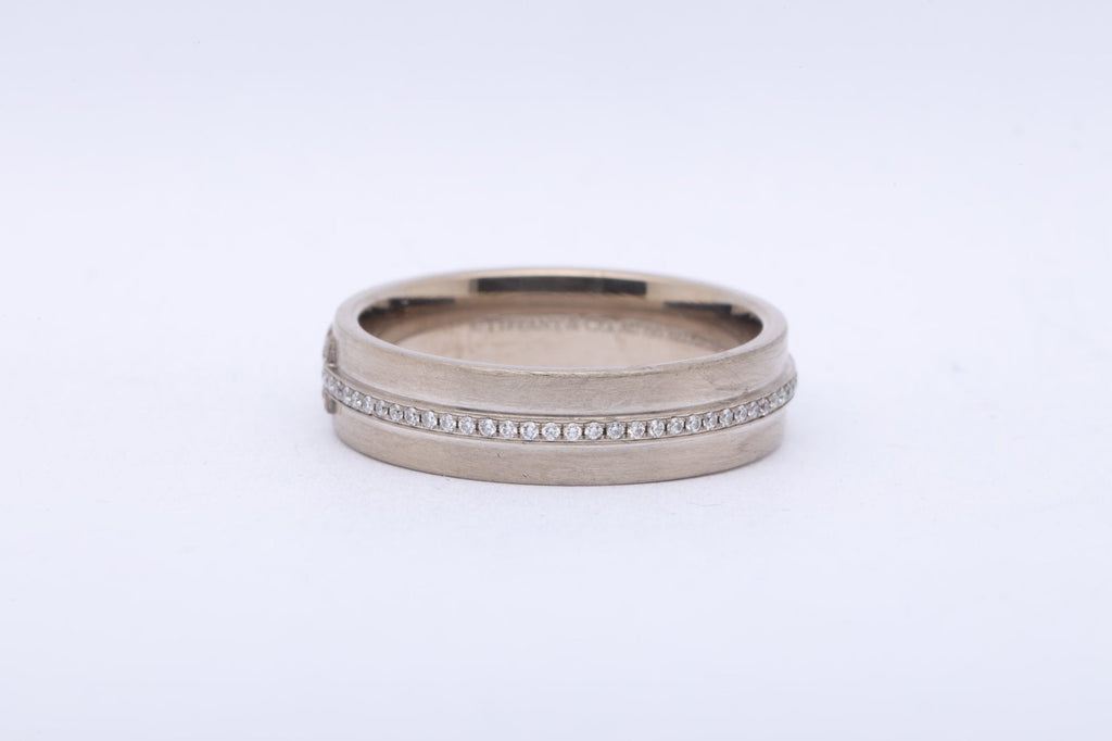 Tiffany & Co.  White Gold  Tiffany T Ring Size 9 (8.10g.)