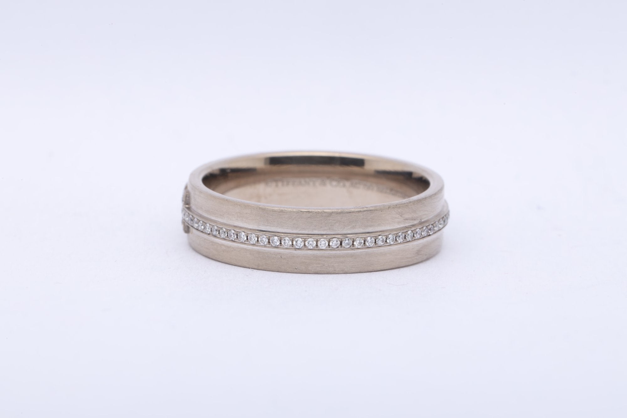 Tiffany & Co.  White Gold  Tiffany T Ring Size 9 (8.10g.)