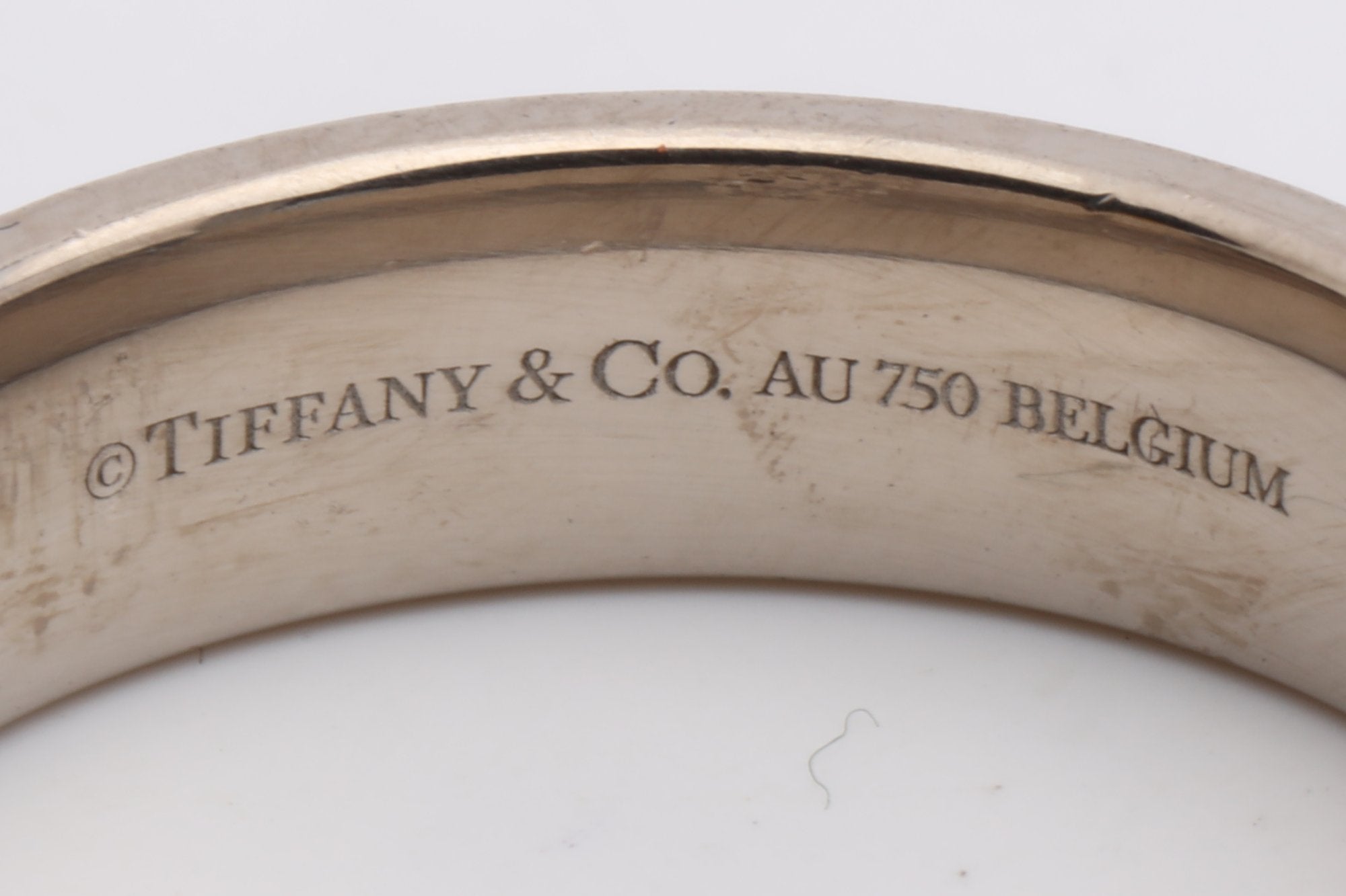 Tiffany & Co.  White Gold  Tiffany T Ring Size 9 (8.10g.)
